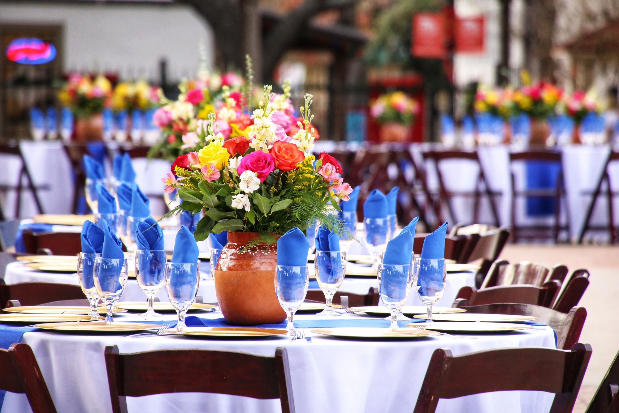 Beautiful table setting at an outdoor wedding venue.